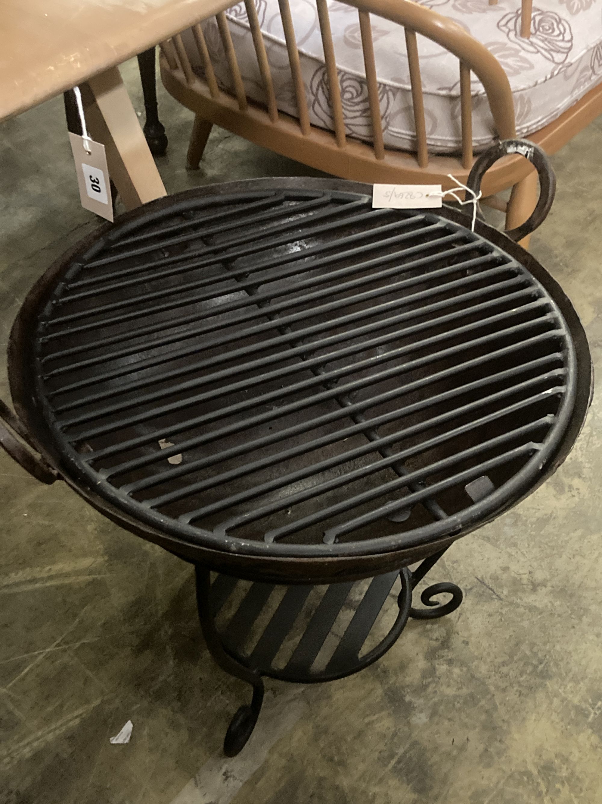 A fire pit with grill and stand, diameter 50cm height 52cm